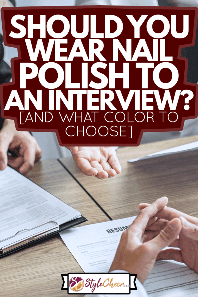 Employer or committee reading a resume and speaking during your candidate profile, Employer in a suit is conducting a job interview, Manager resource employment and recruitment concept, Should I wear nail polish for an interview? [And What Color To Choose]