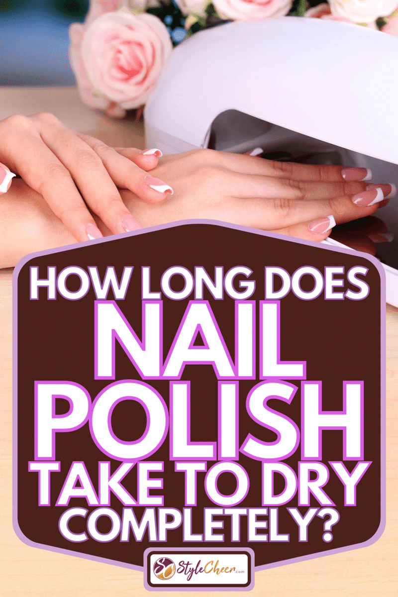 A woman drying her nails on the lamp, How Long Does Nail Polish Take To Dry Completely?