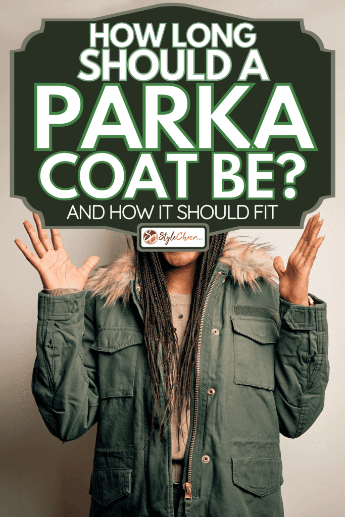 A young african american woman wearing winter parka coat, How Long Should A Parka Coat Be? [And How It Should Fit]