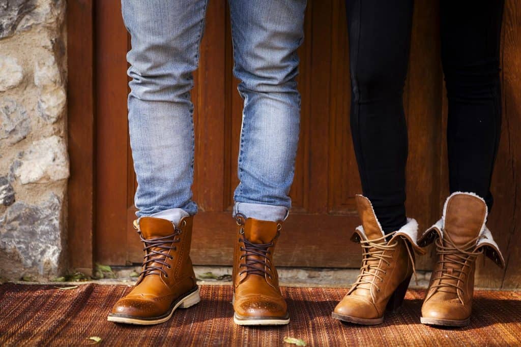 Boy and girl wearing fashion leather boots