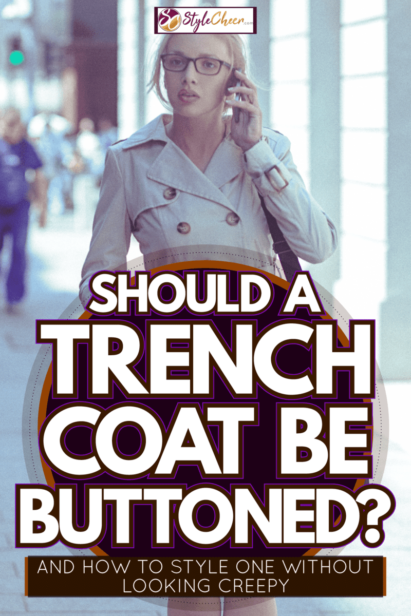 A beautiful blonde woman wearing an off white trench coat while talking on the phone, Should A Trench Coat Be Buttoned? [And How To Style One Without Looking Creepy]
