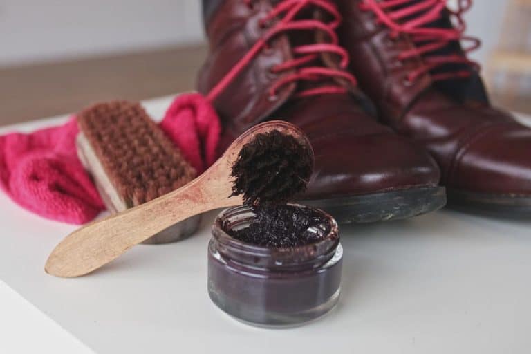 A clean brown leather boots with shoes wax and polished using waterproofing cream, How To Clean Waterproof Leather Boots [In 3 Easy Steps!]
