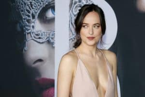 Dakota Johnson at the Los Angeles premiere of 'Fifty Shades Darker' held at the Theatre at Ace, Inside Dakota Johnson's Closet: Building A Capsule Wardrobe With The Basics