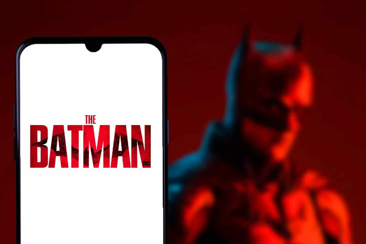 Smart phone with the logo of the batman movie character owned by DC Comics.