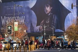 Extra large banner advertising wednesday tv series, From The Screen To The Runway: Wednesday Addams' Legacy Of Style And Substance