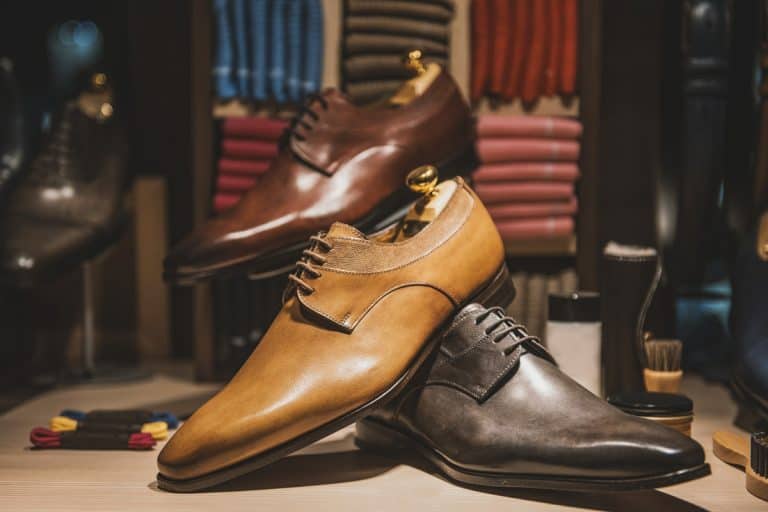 Men shoes in a luxury shop in Paris, Ditch Your Sneakers: Formal Footwear Makes a Comeback in Fashion Today