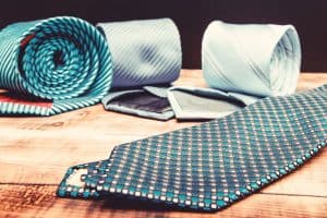 Old neck ties stack away from the wardrobe, From Ties to Trend: How TikTok Users are Upcycling Old Neckties into Chic Clothing!
