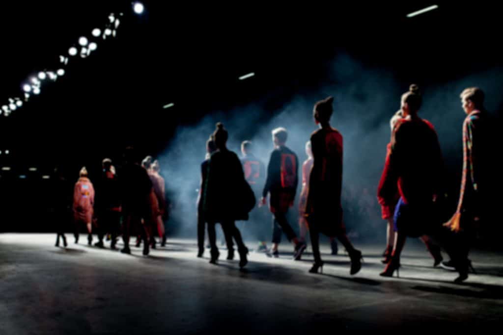 fashion week fashion runway fashion models walking on dark runway