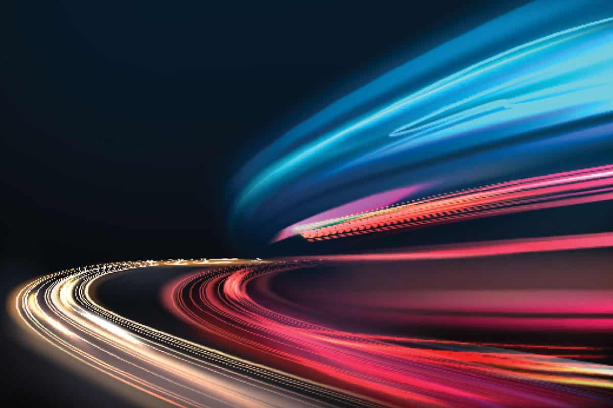 Vector image of colorful light trails with motion blur effect, long time exposure. Isolated on background
