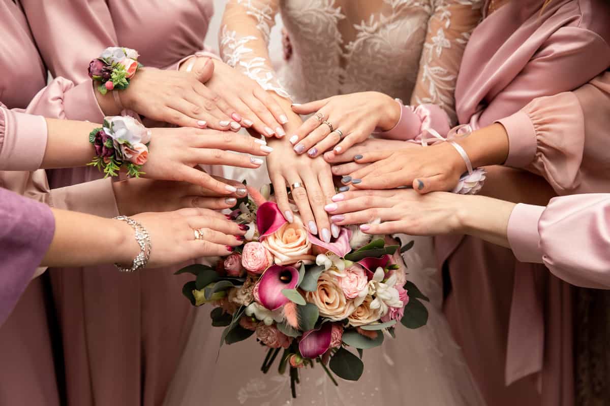 Bride, bridesmaids and wedding bouquet
