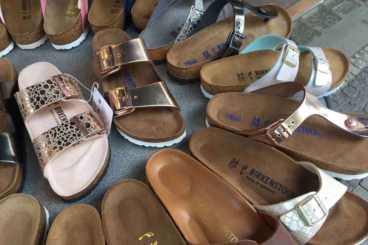 Dozens of Birkenstock sandals displayed