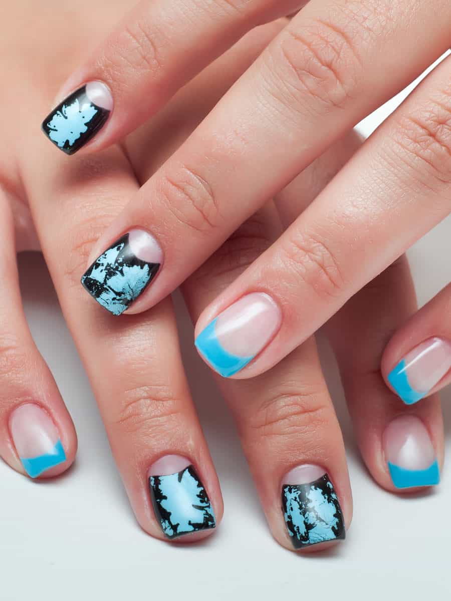 blue and black abstract French manicure with cloud design