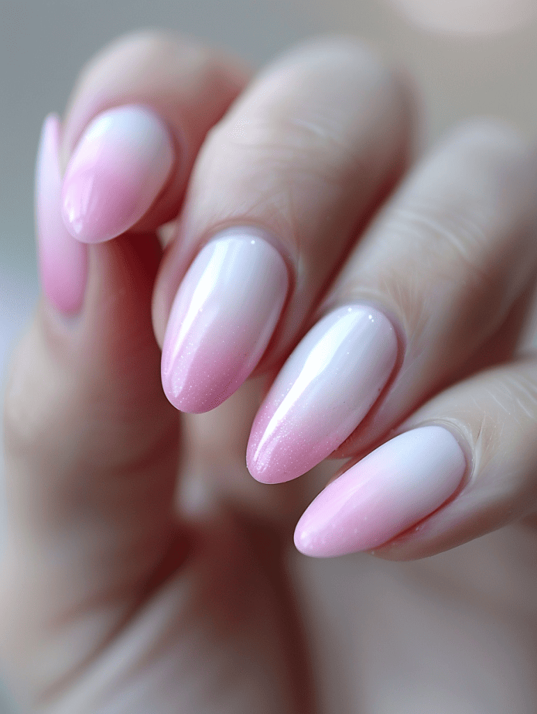 Ombre nail design. pastel pink to white transition