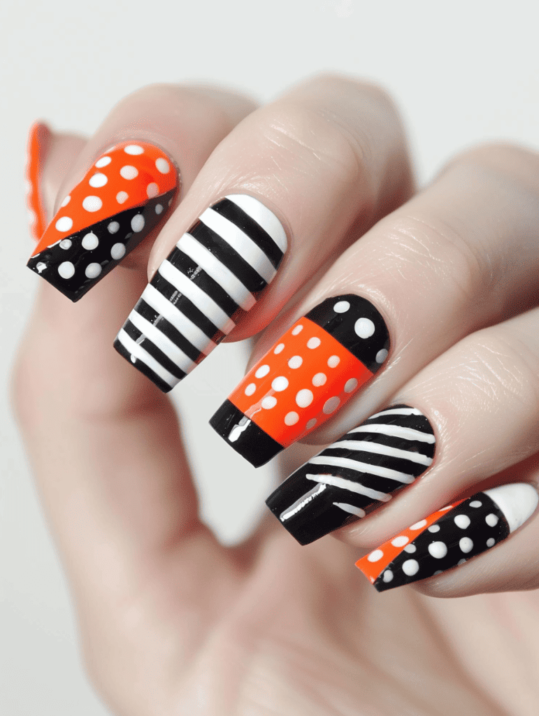 geometric nail art with a circles and stripes combo
