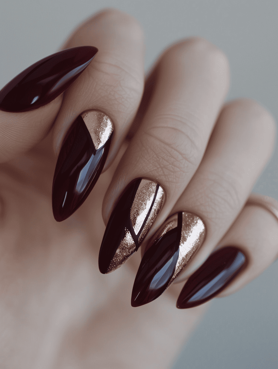  two-tone nail design. deep burgundy and rose gold geometric