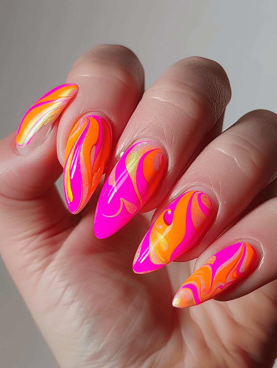  neon nail art. fluorescent orange with neon pink marbled effect
