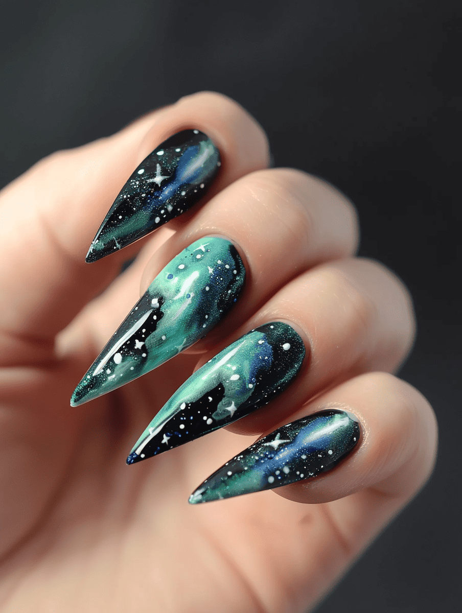 space-themed nail design. aurora borealis effect in green and blue