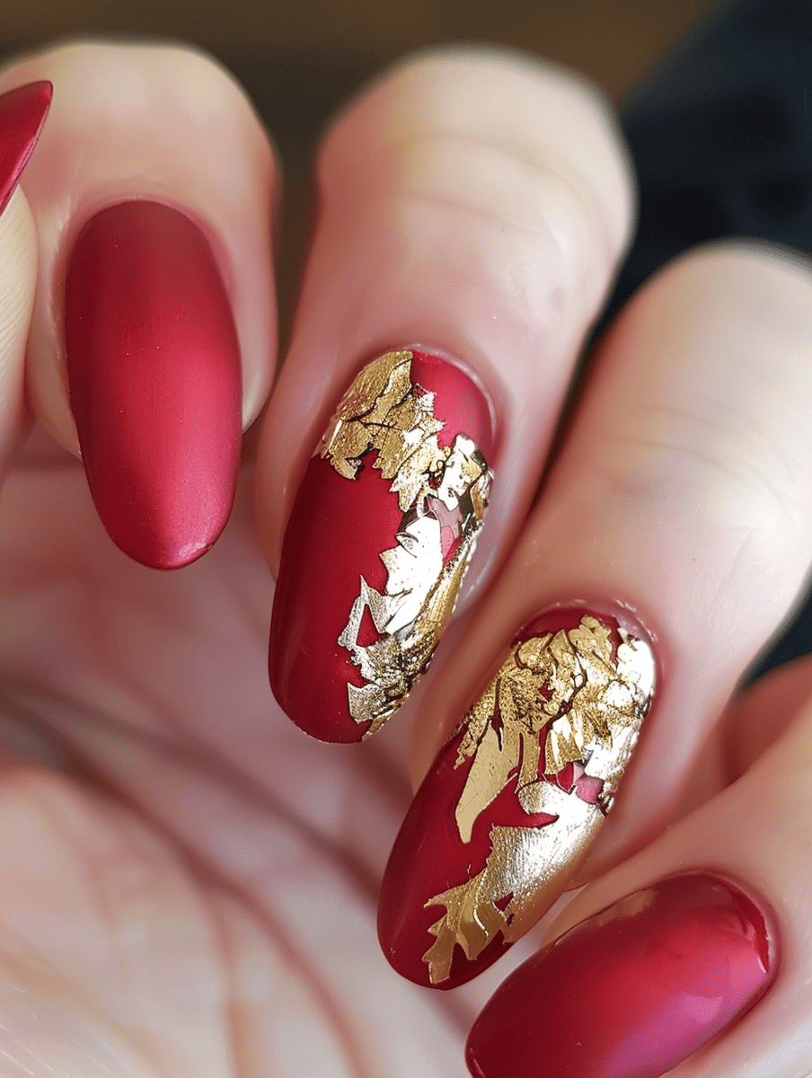 red and gold nail art. gold leaf on matte red