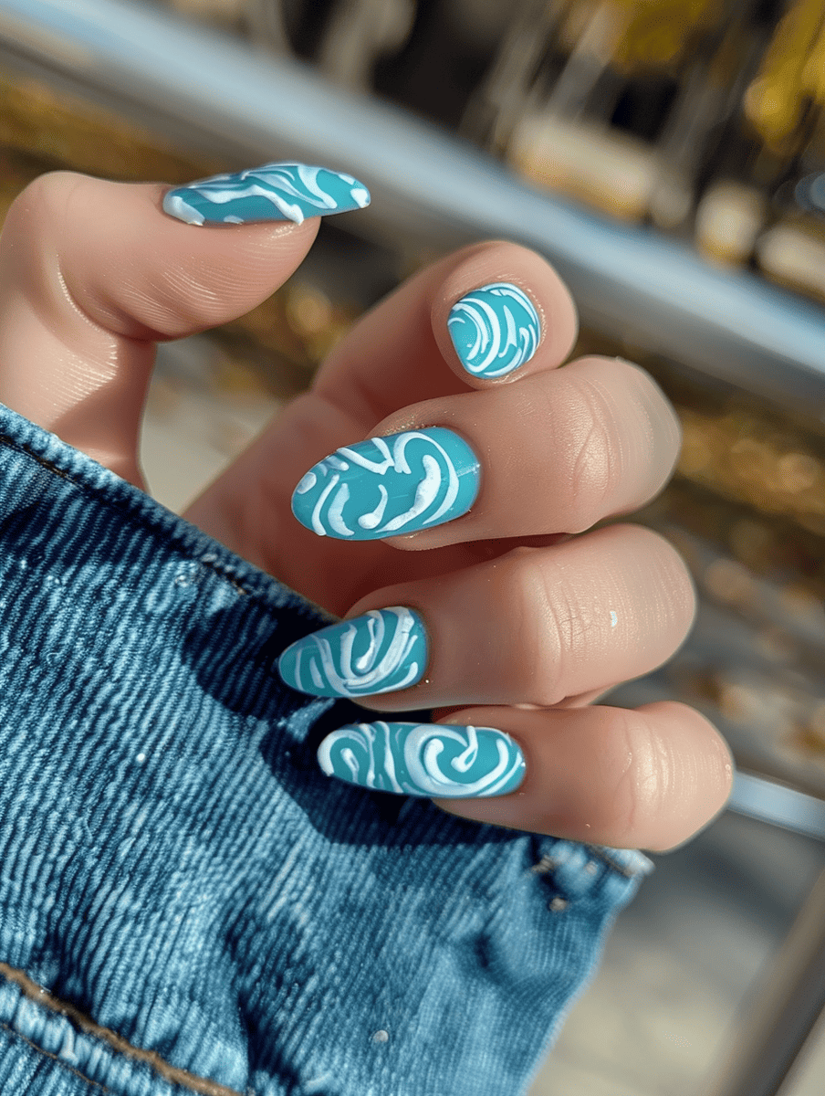 spring nails. aqua marine with white wave patterns
