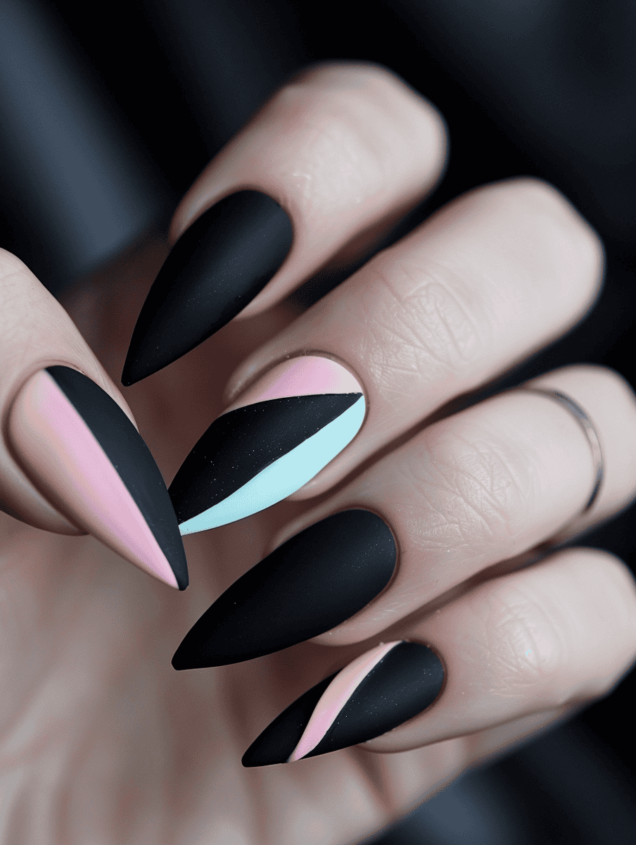 matte black nail design with pastel accents