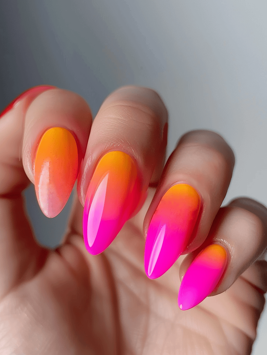 Neon gradient nail design hot pink to tangerine tropical sunrise
