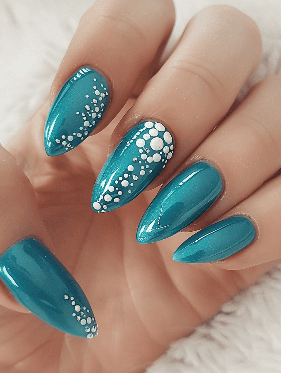 Turquoise blue with silver dotting winter nail design
