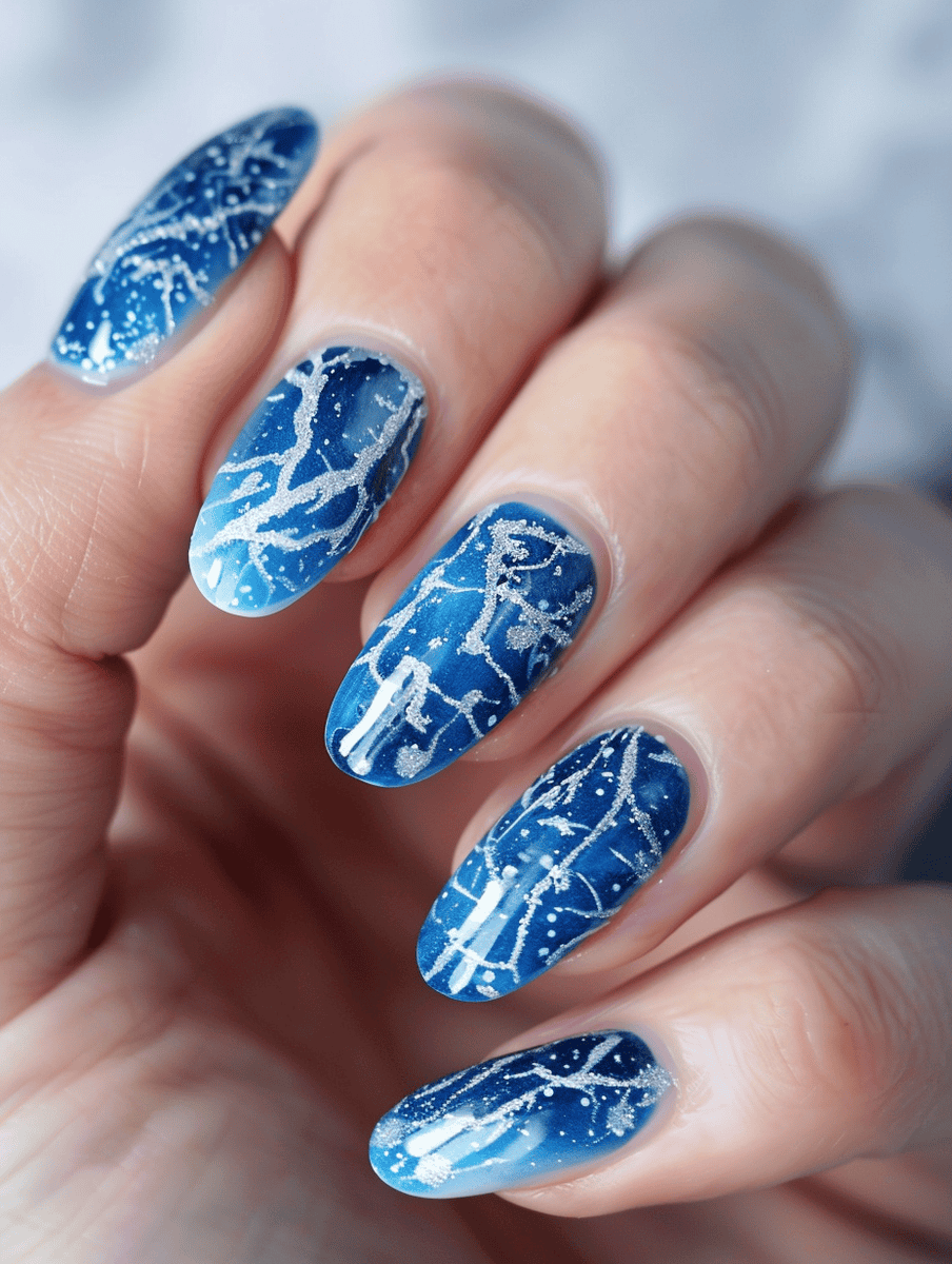 Blue marble with silver veins winter nail design