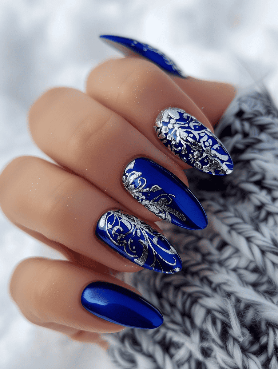 Glossy cobalt with silver Art Deco patterns winter nail design

