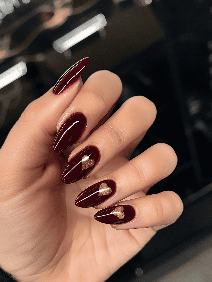 Burgundy nails with golden hearts