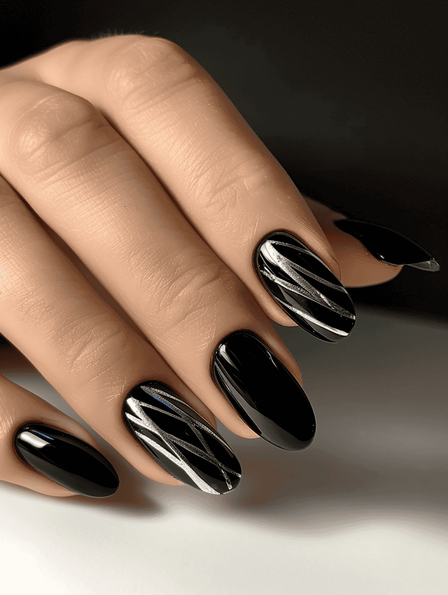 high-gloss nail art. black with silver stripes