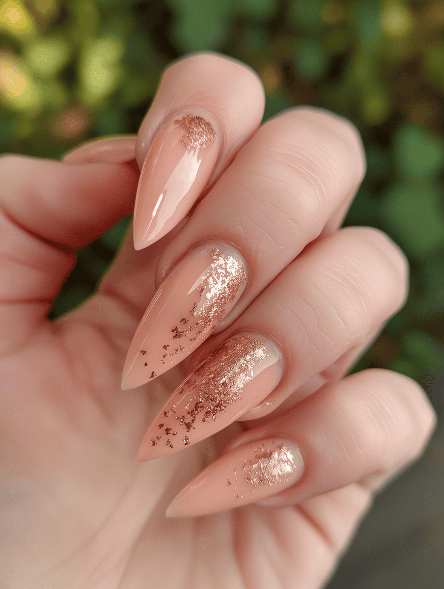 high-gloss nail art. nude with rose gold flakes