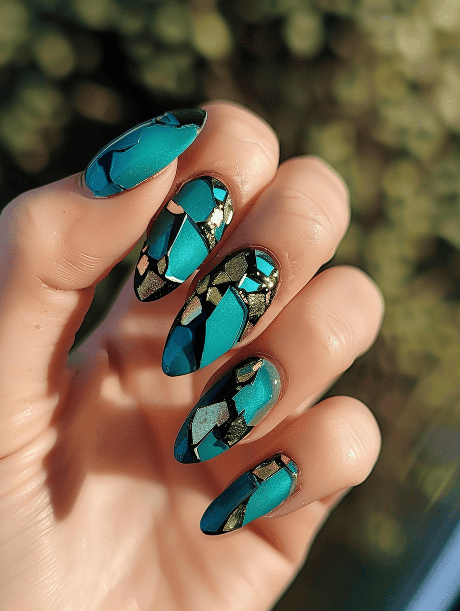 Shattered glass nail design with turquoise, gold flecks, and black accents