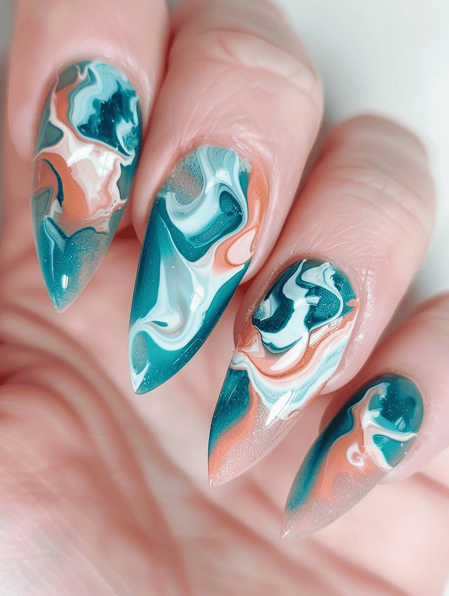 Teal and coral nail design featuring abstract art with mesmerizing swirls